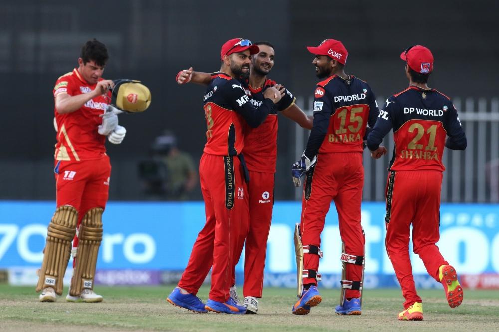 The Weekend Leader - IPL 2021: RCB beat Punjab Kings by 6 runs, seal play-off berth